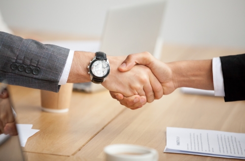 closeup-view-handshake-two-businessmen-suits-shaking-hands